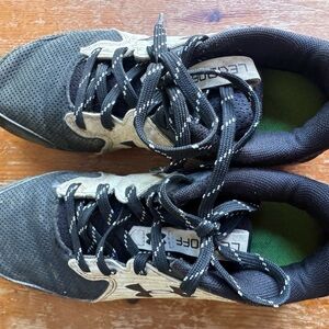 Black and White Under Armor Cleats